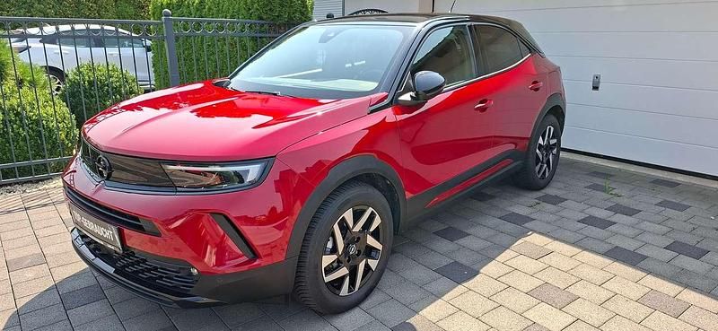 Power rot metallic Gebraucht 2022 Opel Mokka-e GS Line SUV | 17.499 € (Guter Preis) - Bild 1/4
