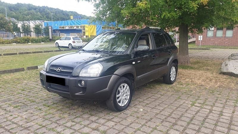 Grün Gebraucht 2005 Hyundai Tucson SUV | 5.350 € (Etwas zu teuer) - Bild 1/4