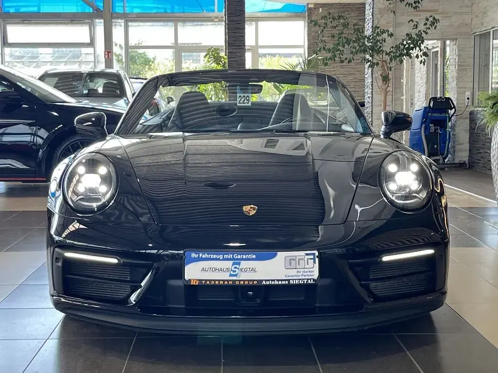 Gebraucht Porsche 911 480 PS (353 kW) 2023 Schwarz tiefschwarzmetallic (metallic) Cabrio