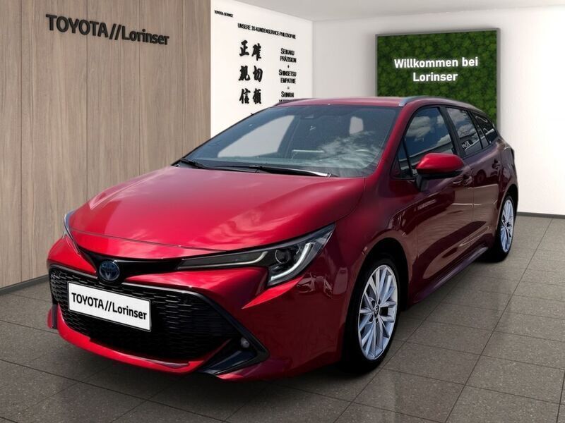 Emotional red 2 Gebraucht 2022 Toyota Corolla Team Kombi | 22.990 € (Superpreis) - Bild 1/4