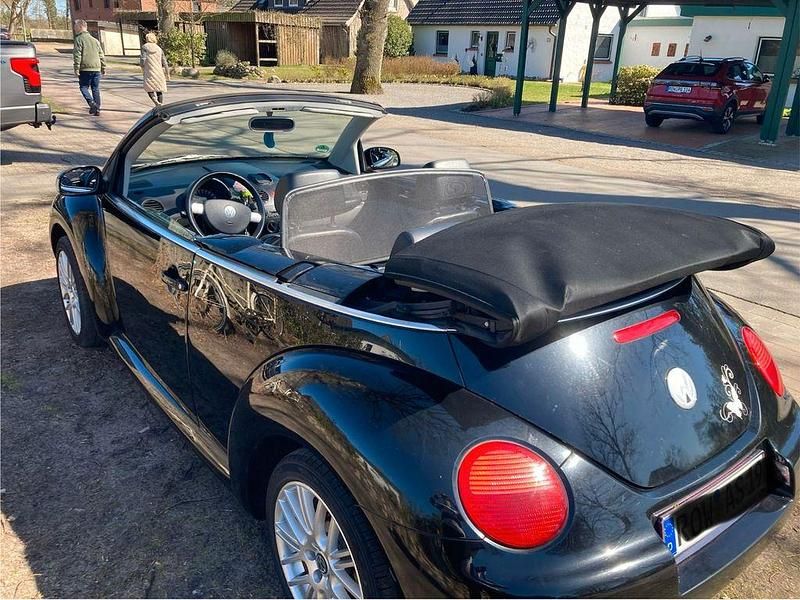 Gebraucht VW New Beetle 75 PS (55 kW) 2003 Schwarz Kleinwagen