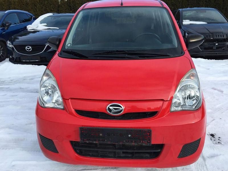 Gebraucht Daihatsu Cuore 69 PS (50 kW) 2011 Rot Kleinwagen