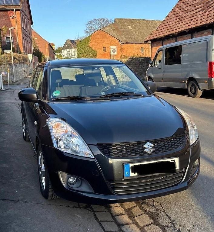 Schwarz Gebraucht 2011 Suzuki Swift Comfort Limousine | 4.499 € (Superpreis) - Bild 1/4