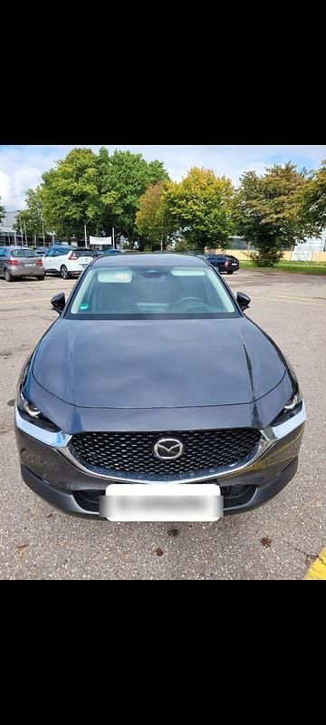Grau Gebraucht 2024 Mazda CX-30 Homura-Line SUV | 22.800 € (Superpreis) - Bild 1/4