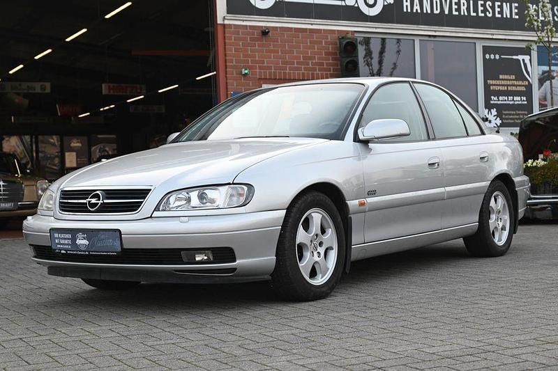Second-hand Opel Omega Edition 144 CP (105 kW) 2000 Argintiu Berlinǎ