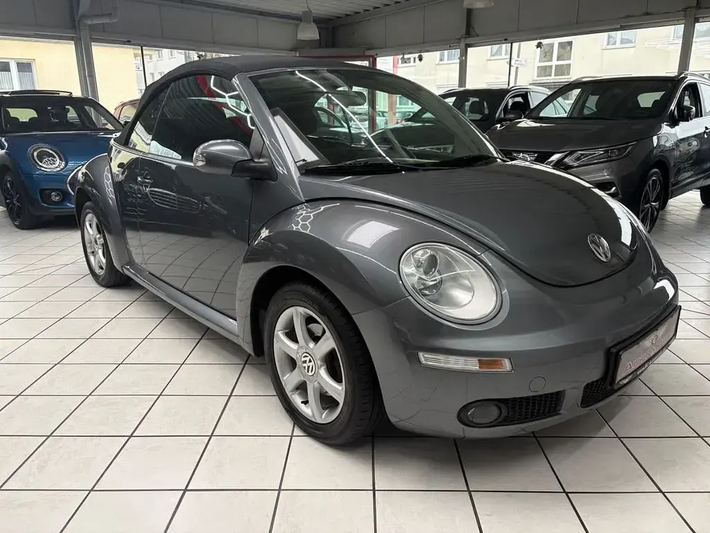 Gebraucht VW New Beetle Cabriolet 102 PS (75 kW) 2010 Grau Cabrio