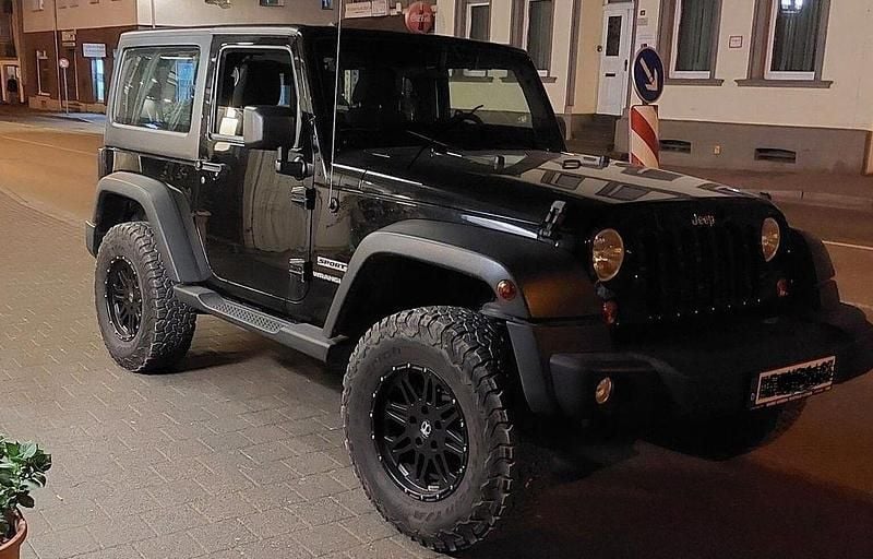 Schwarz Gebraucht 2011 Jeep Wrangler Sport SUV | 24.000 € - Bild 1/4