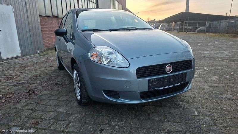 Grau Gebraucht 2012 Fiat Grande Punto Basis Kleinwagen | 3.800 € (Fairer Preis) - Bild 1/4