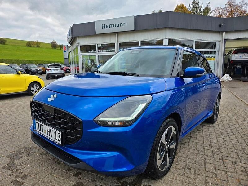 Blau Neu 2025 Suzuki Swift Comfort+ Kleinwagen | 22.930 € - Bild 1/4
