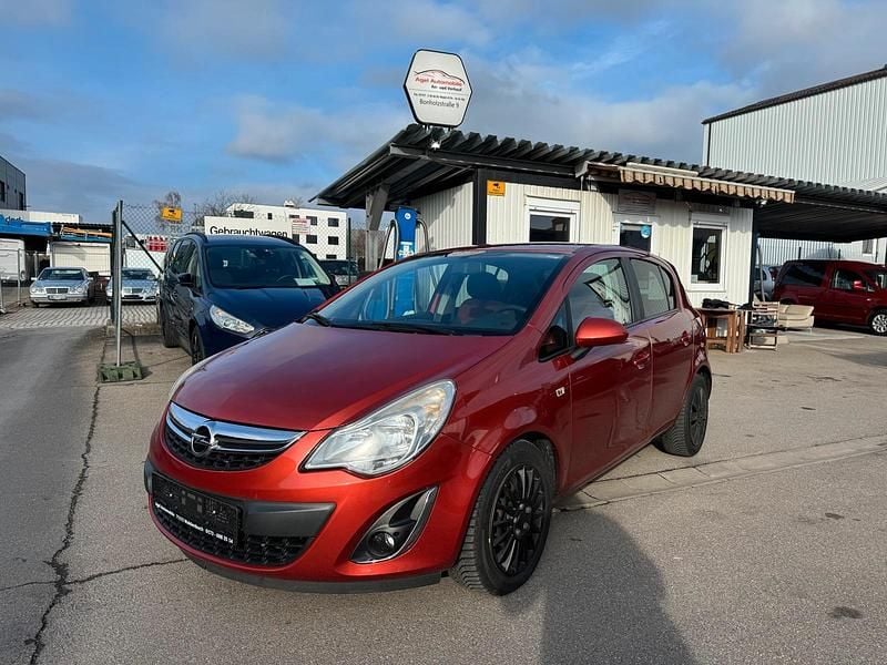 Gebraucht Opel Corsa 101 PS (74 kW) 2012 Henna rot p2 / curry red (m2) Kleinwagen