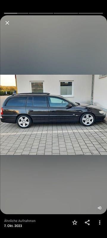 Gebraucht Opel Omega Design Edition 144 PS (105 kW) 2001 Schwarz Kombi
