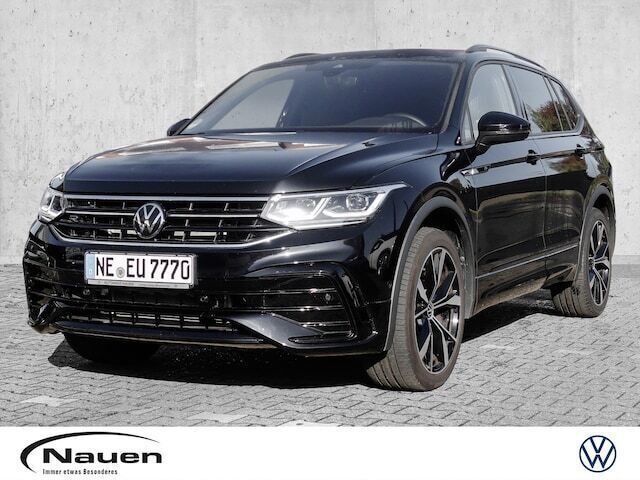 Deep black perleffekt (schwarz) Gebraucht 2024 VW Tiguan Allspace R-line SUV | 52.855 € (Teuer) - Bild 1/4