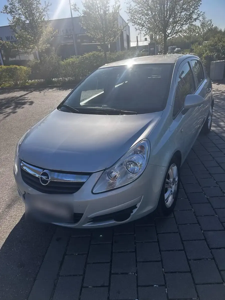 Second-hand Opel Corsa 90 CP (66 kW) 2009 Argintiu Hatchback