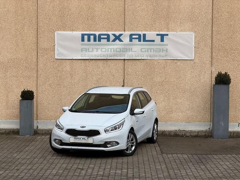 Weiß Gebraucht 2014 Kia Ceed Sportswagon Vision Kombi | 3.970 € (Fairer Preis) - Bild 1/4
