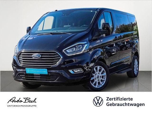 Schwarz (iridiumschwarz metallic) Gebraucht 2018 Ford Tourneo Custom Titanium Van / Kleinbus | 30.980 € (Fairer Preis) - Bild 1/4