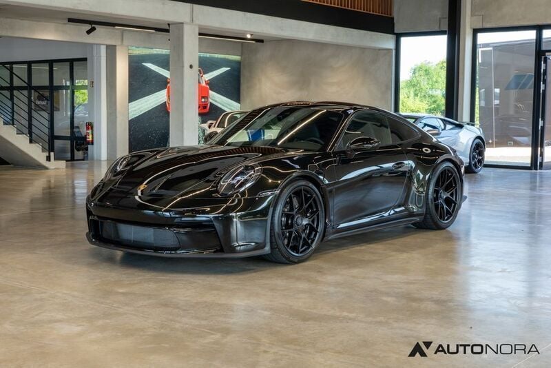 Pts dunkelolive Gebraucht 2024 Porsche 992 Coupé | 449.900 € - Bild 1/4