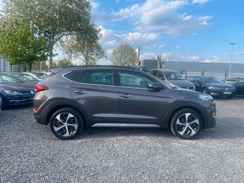 Moon rock / met Gebraucht 2018 Hyundai Tucson Premium SUV | 19.900 € - Bild 1/4