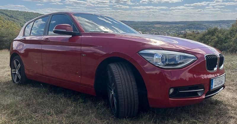 Gebraucht BMW 118 Sport Line 170 PS (125 kW) 2011 Rot Kleinwagen