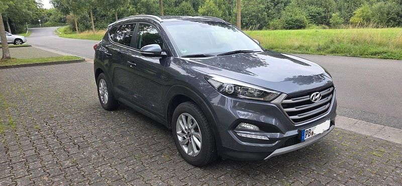 Grau Gebraucht 2016 Hyundai Tucson Trend SUV | 15.500 € (Fairer Preis) - Bild 1/4