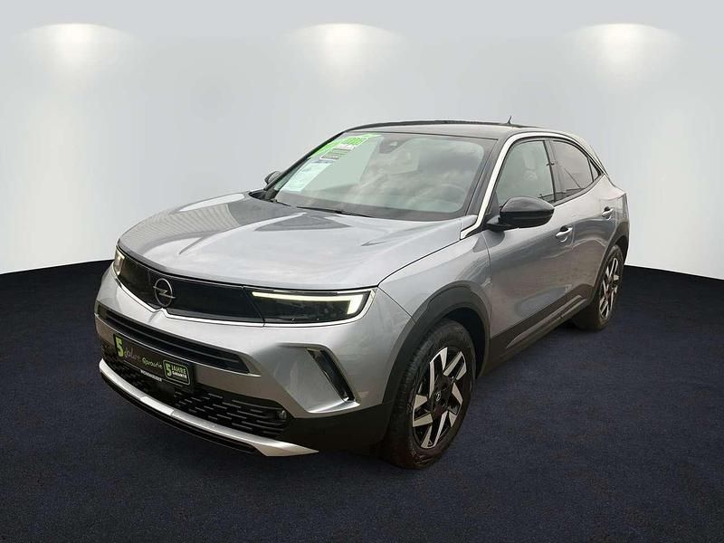 Kontrast grau/quarz silber Gebraucht 2022 Opel Mokka-e Elegance SUV | 15.490 € (Superpreis) - Bild 1/4