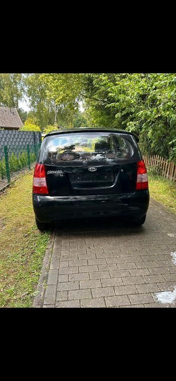 Second-hand Kia Picanto LX 65 CP (47 kW) 2007 Portocaliu Hatchback