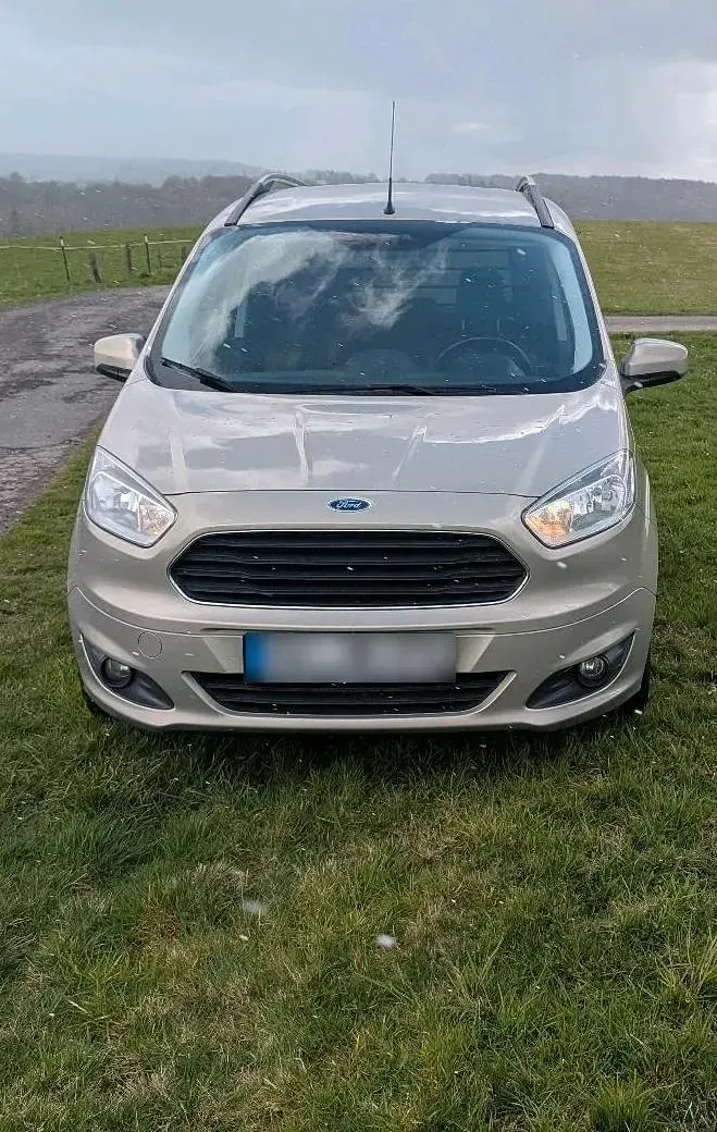 Gebraucht Ford Tourneo Courier 101 PS (74 kW) 2018 Silber Van / Kleinbus