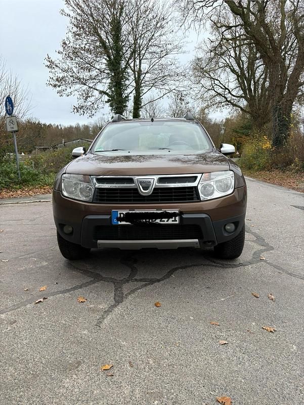 Braun Gebraucht 2012 Dacia Duster SUV | 5.400 € (Fairer Preis) - Bild 1/4