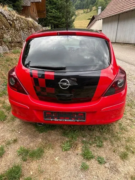 Gebraucht Opel Corsa 101 PS (74 kW) 2010 Rot Kleinwagen