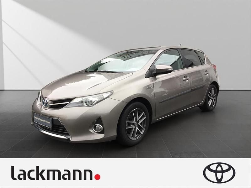 Bronze Gebraucht 2014 Toyota Auris Hybrid Edition Limousine | 13.490 € (Fairer Preis) - Bild 1/4