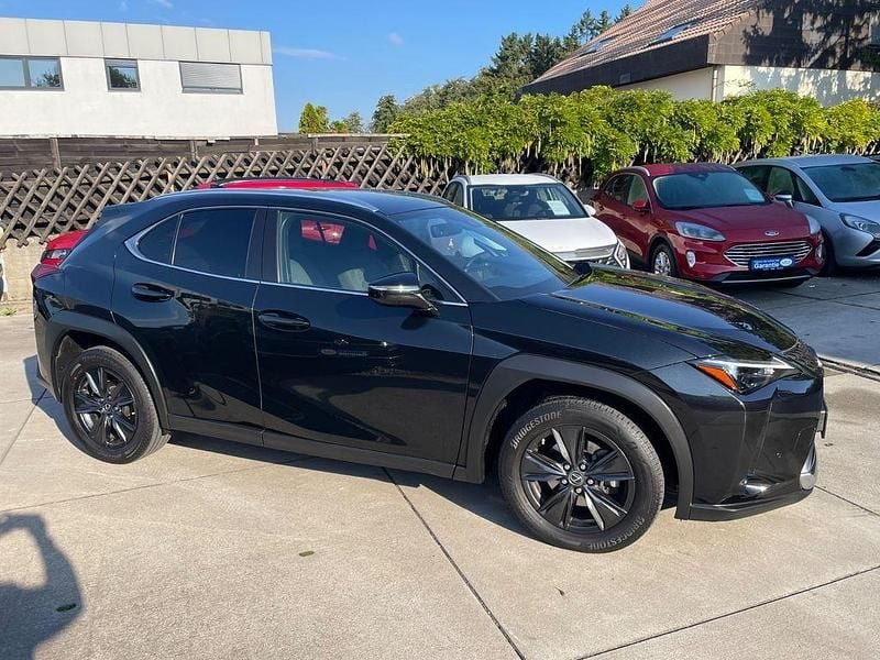 Graphite black Gebraucht 2023 Lexus UX 250h SUV | 27.999 € (Guter Preis) - Bild 1/4