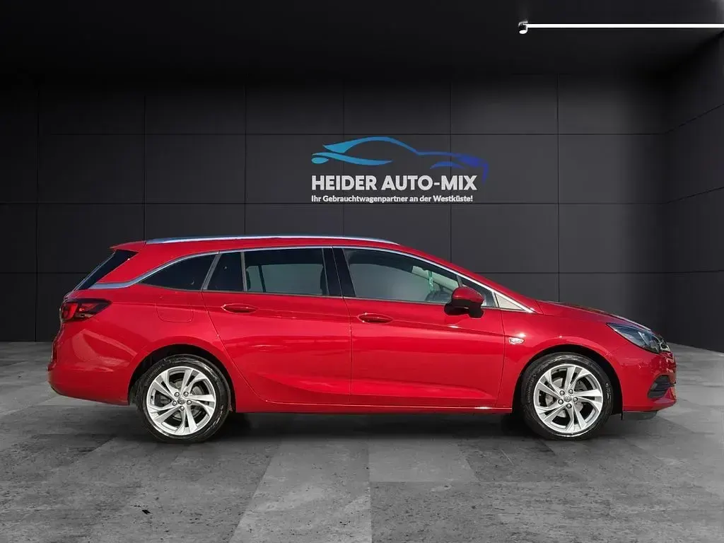 Używany Opel Astra 131 KM (96 kW) 2020 Czerwony Kombi