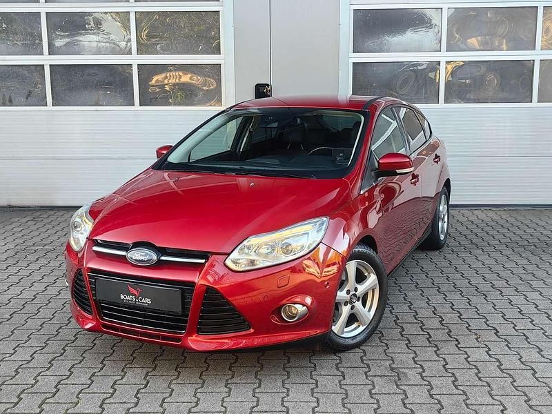 Red candy/candy red Gebraucht 2011 Ford Focus Titanium Kleinwagen | 5.990 € (Fairer Preis) - Bild 1/4