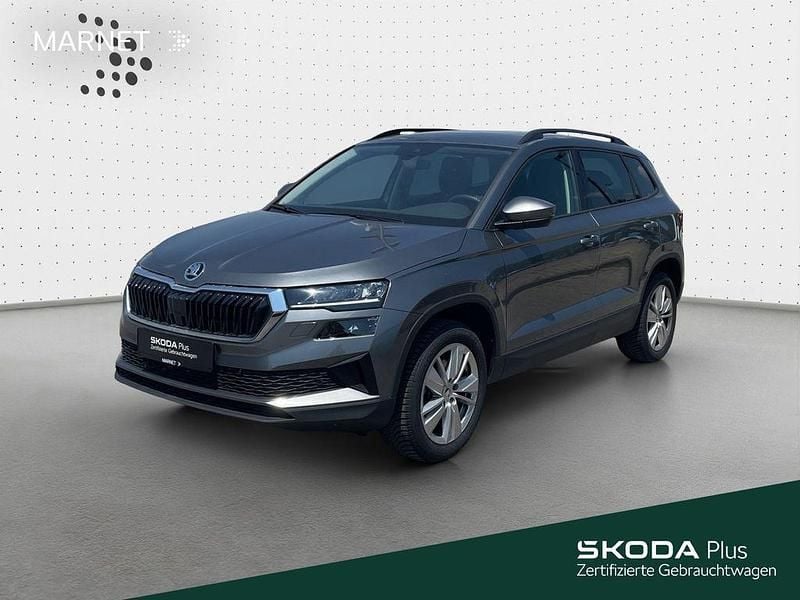 Graphitegrau metallic Gebraucht 2024 Skoda Karoq Selection SUV | 29.390 € (Guter Preis) - Bild 1/4