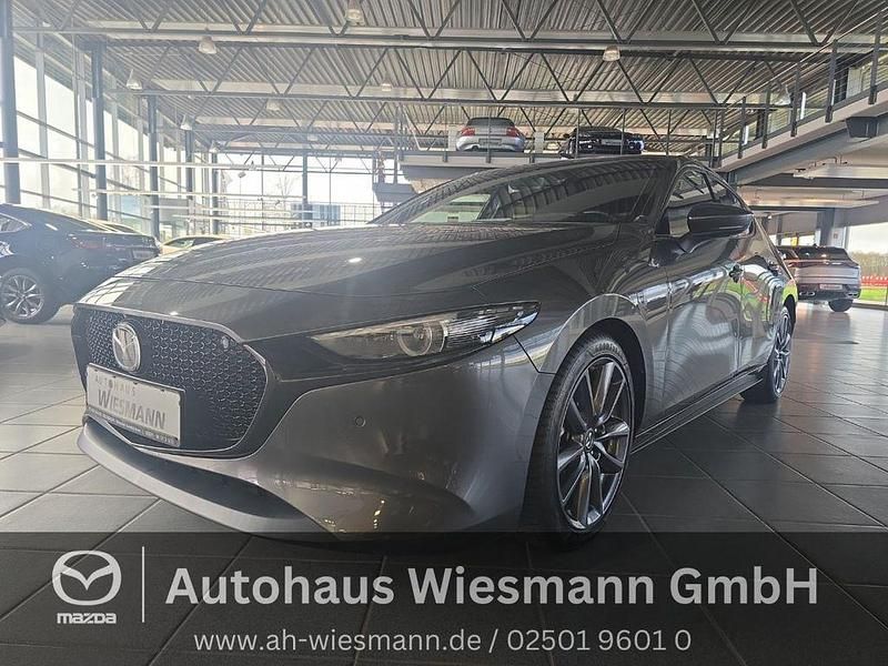 Grau Gebraucht 2019 Mazda 3 Selection Limousine | 20.990 € (Fairer Preis) - Bild 1/4