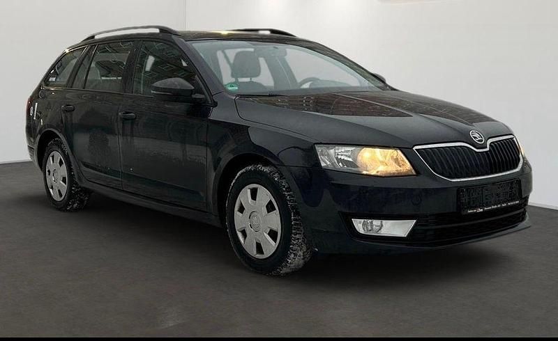 Second-hand Skoda Octavia Active 105 CP (77 kW) 2013 Negru Break