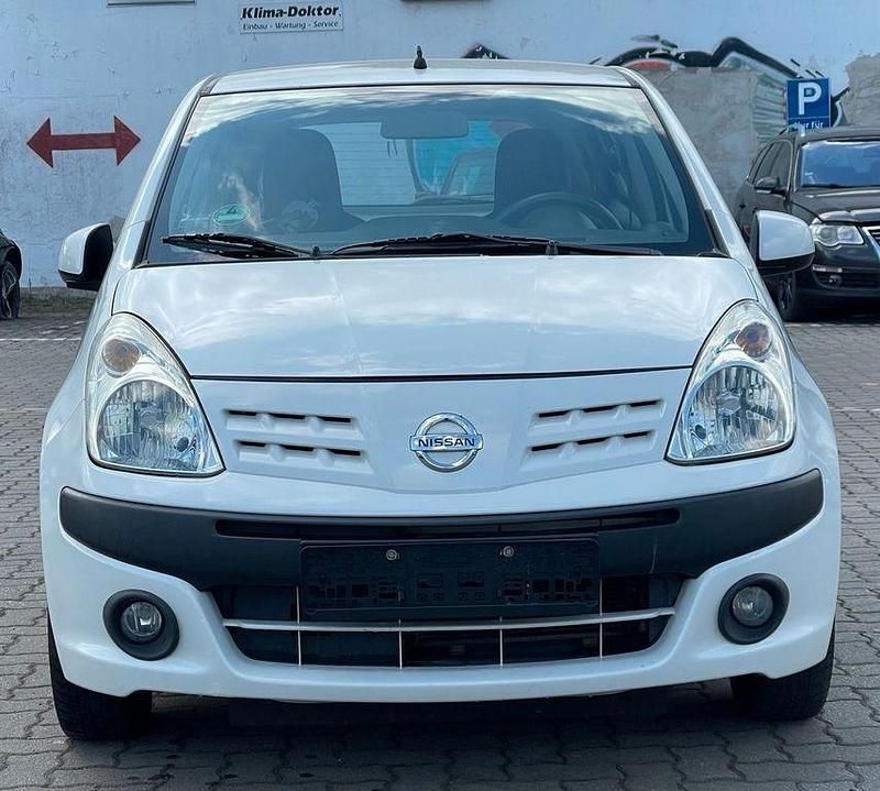 Weiß Gebraucht 2009 Nissan Pixo Acenta Kleinwagen | 2.490 € (Fairer Preis) - Bild 1/4