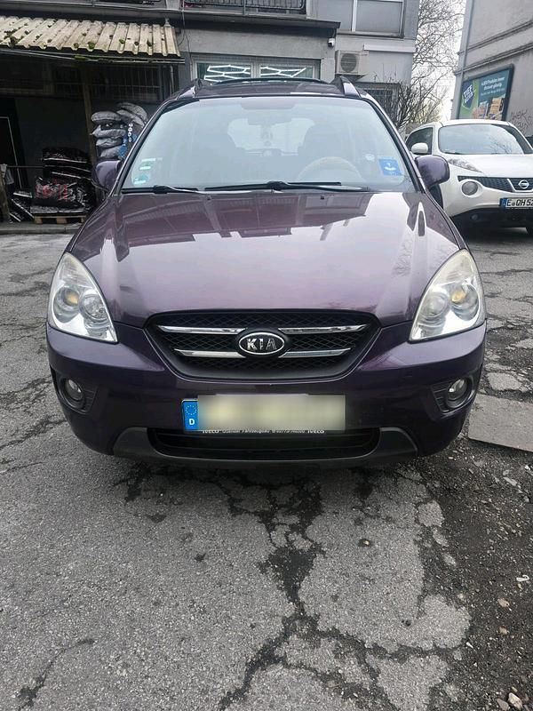 Gebraucht Kia Carens 104 PS (76 kW) 2008 Violet Van / Kleinbus