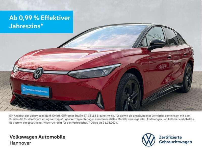 Kings red metallic Gebraucht 2024 VW ID.7 GTX Limousine | 52.950 € - Bild 1/3