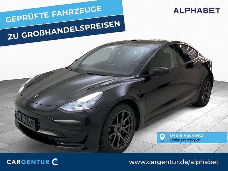 Solid black (metallic) Gebraucht 2022 Tesla Model 3 Limousine | 25.595 € (Fairer Preis) - Bild 1/2