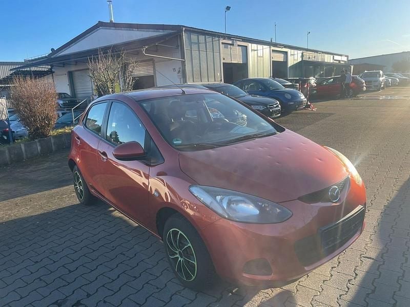 Second-hand Mazda 2 Active 75 CP (55 kW) 2010 Portocaliu Hatchback