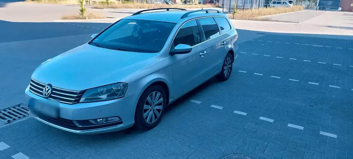 Second-hand VW Passat 140 CP (102 kW) 2013 Argintiu Break