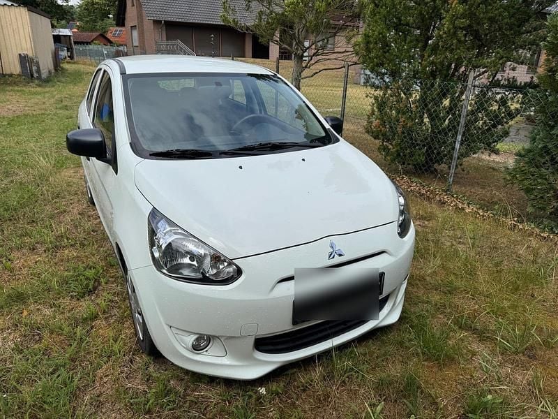 Weiß Gebraucht 2014 Mitsubishi Space Star Kleinwagen | 2.600 € (Fairer Preis) - Bild 1/4