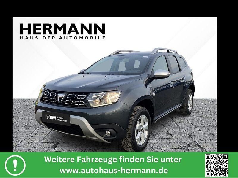 Kometengrau metallic (grau) Gebraucht 2018 Dacia Duster Comfort SUV | 11.982 € (Fairer Preis) - Bild 1/4