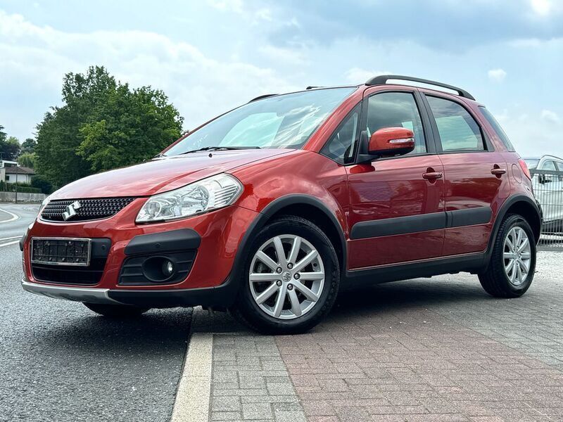 Orange Gebraucht 2013 Suzuki SX4 Style SUV | 7.500 € (Superpreis) - Bild 1/4