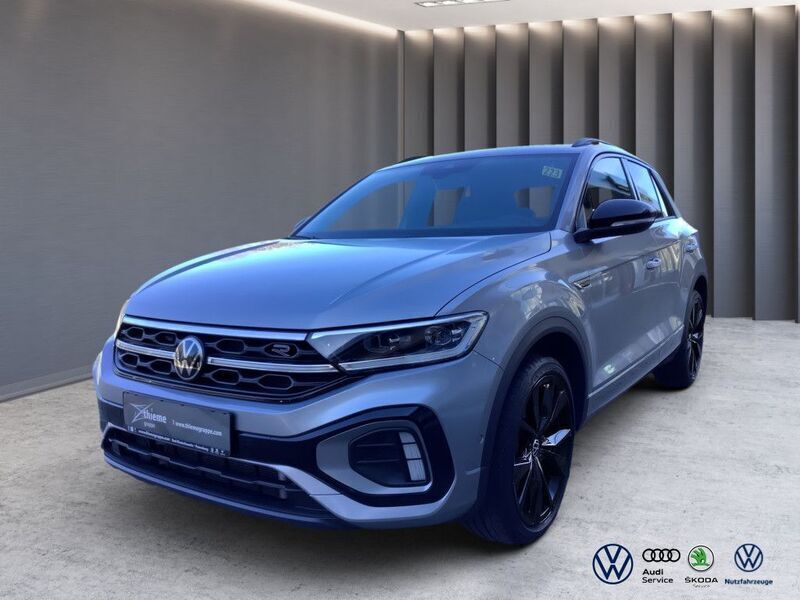 Silber / pyrit silber (metallic) Gebraucht 2024 VW T-Roc R-line SUV | 29.950 € (Fairer Preis) - Bild 1/4