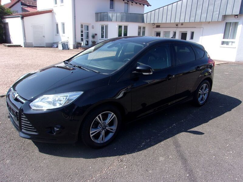 Schwarz Gebraucht 2014 Ford Focus Limousine | 7.900 € (Fairer Preis) - Bild 1/4