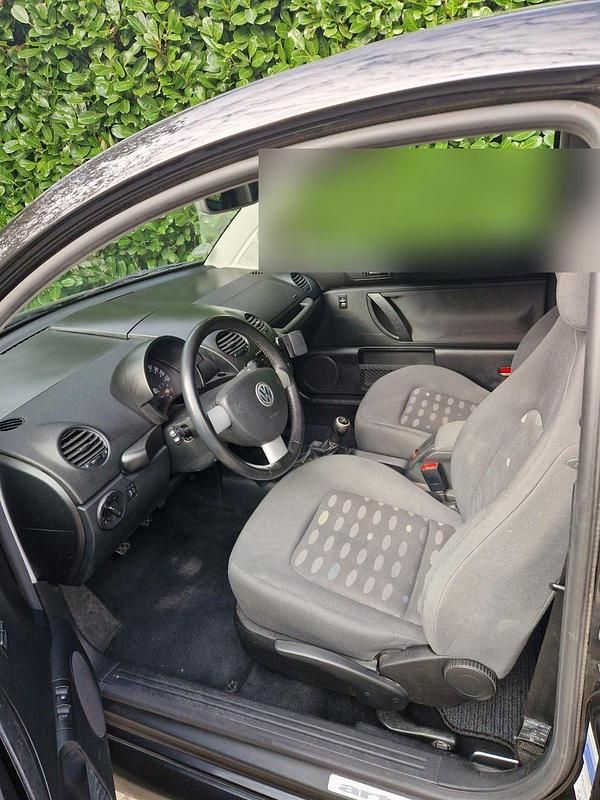 Gebraucht VW New Beetle 101 PS (74 kW) 2004 Schwarz Kleinwagen