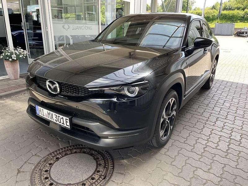 Jet black Gebraucht 2024 Mazda MX30 Ad'Vantage SUV | 27.990 € (Fairer Preis) - Bild 1/4