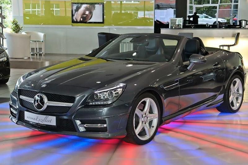 Tenoritgrau Gebraucht 2015 Mercedes SLK250 AMG line Cabrio | 28.950 € (Etwas zu teuer) - Bild 1/4