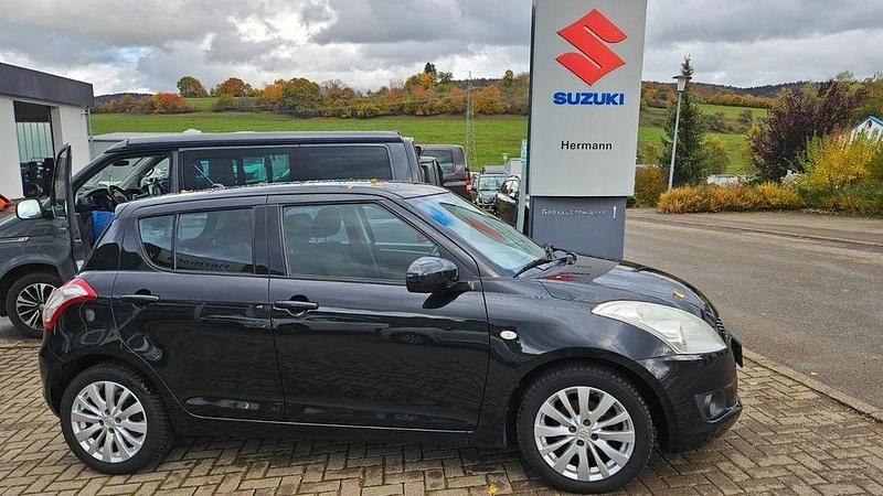 Schwarz Gebraucht 2011 Suzuki Swift Comfort Limousine | 4.600 € (Fairer Preis) - Bild 1/4